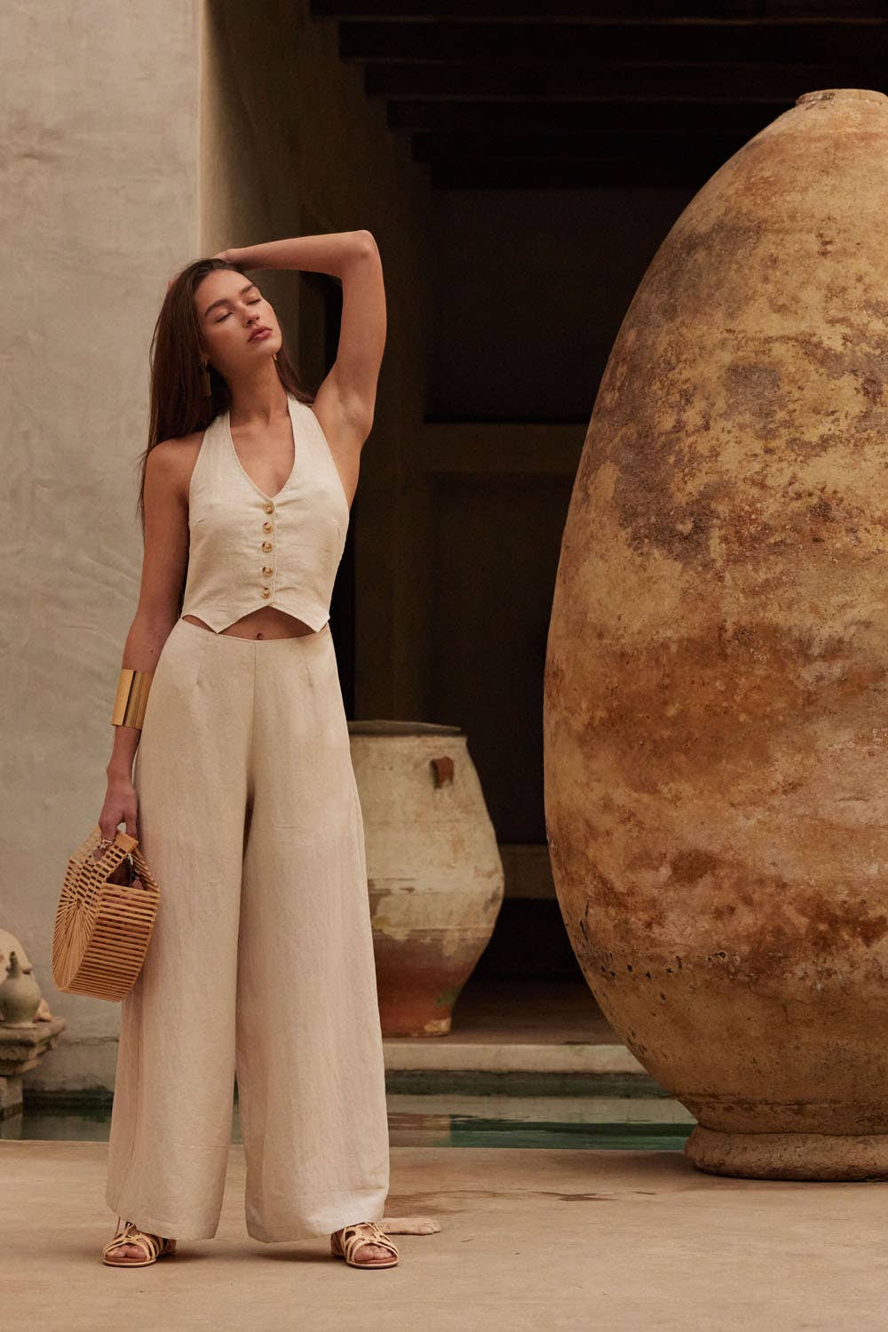 Solid Textured Wide-Leg Halter Vest Jumpsuit